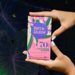 70% cacao con macadamia y nueces 65 grs